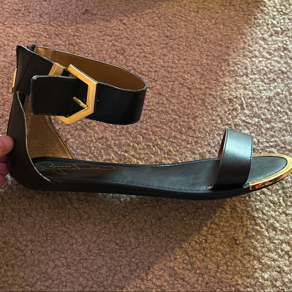 Report Signature Black and Gold Sandals with Metallic Accents